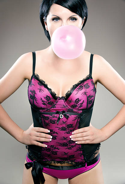 istock sexy brunette with bubblegum 153740380