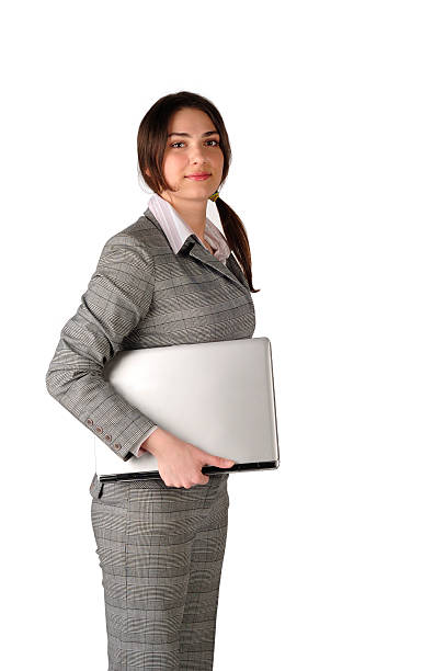 Young business lady with laptop stock photo