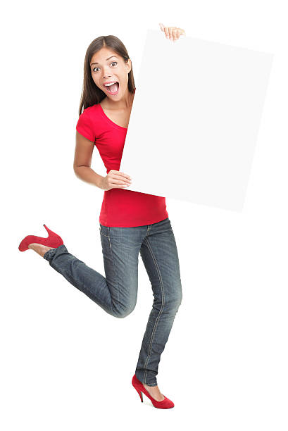 istock Excited young woman holding empty white board 153741352