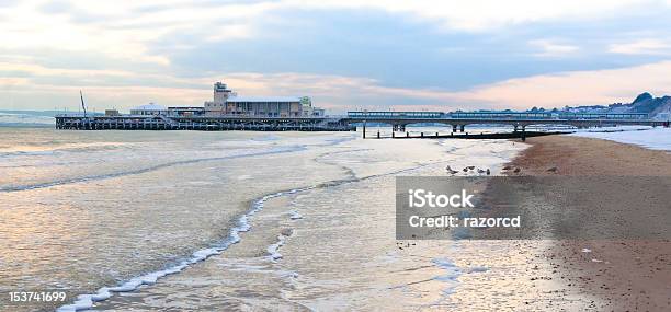 Pier Stock Photo - Download Image Now - Bournemouth - England, Winter, Sunset