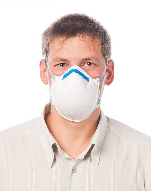 istock Young man in dust respirator 153743603