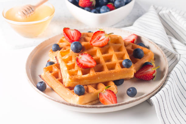 istock Belgian waffles for breakfast. Dessert food concept. 1537439253