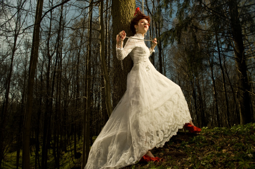 Young Woman in a Vintage Wedding Dress