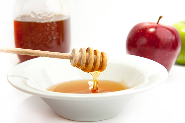 istock Plate with the fresh honey and apples 153744433