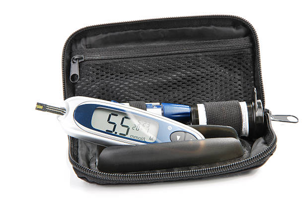 Diabetic Glucometer Blood sugar level testing kit stock photo