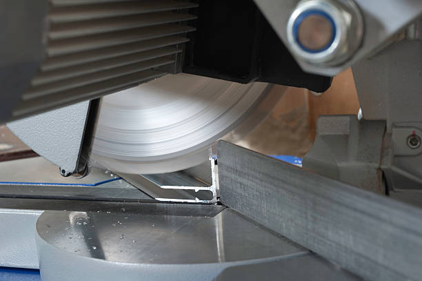 Circular saw cutting metal in shop