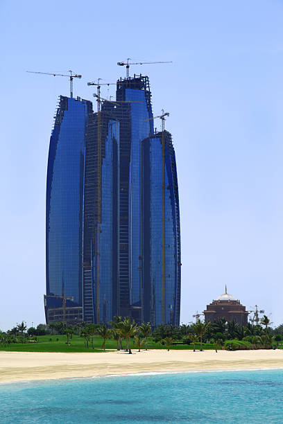 istock Building Etihad Towers behind beach 153744976