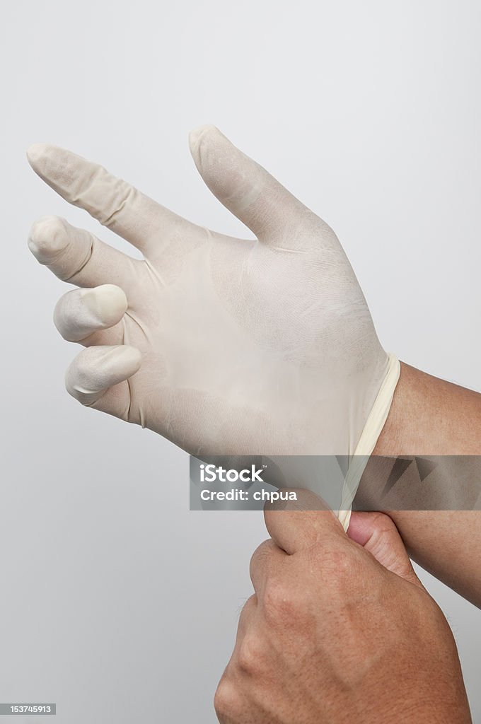 Homem mão com luva de borracha - Royalty-free Braço Humano Foto de stock