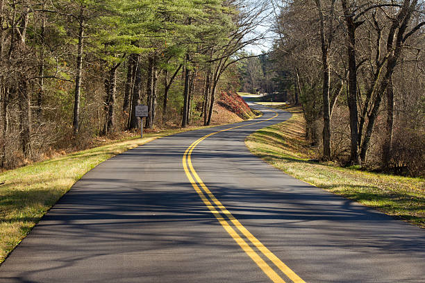 istock Winding country road 153747202