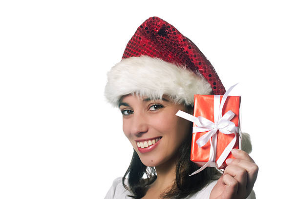 Beautiful christmas girl with a gift stock photo
