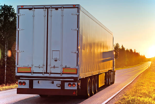 istock Truck on a road in the evening 153748257