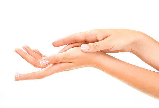 woman's hands with care cream stock photo