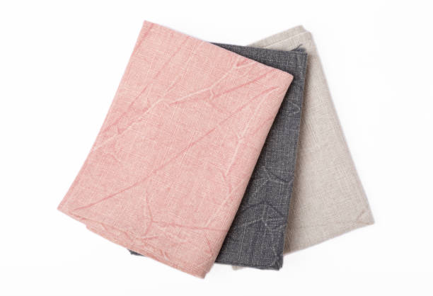 istock Kitchen towel .Checkered napkin isolated on white background. Picnic towel. Home textiles. Folded cloth.Food serving design element. Square napkin. 1537490255
