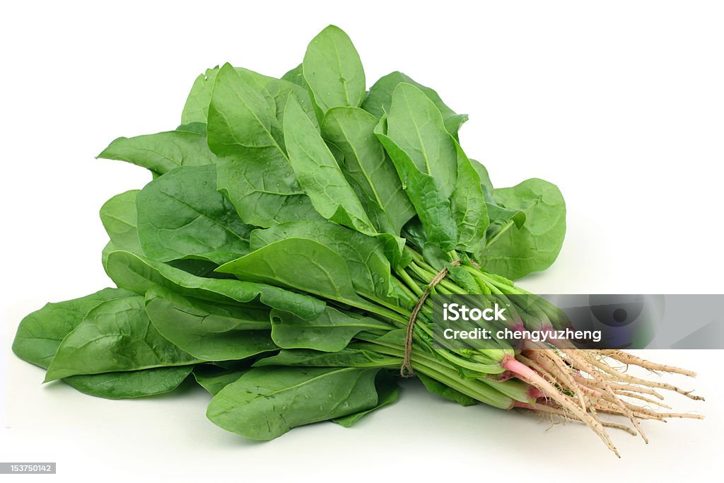Bunch spinach Bunch spinach on white Spinach Stock Photo