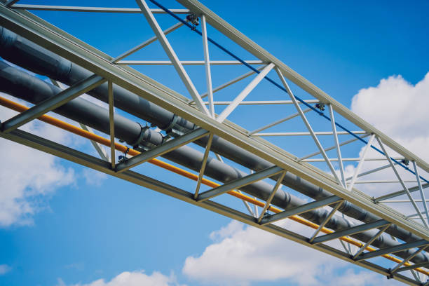 istock Modern steam pipeline for industrial on blue skies background. 1537503328