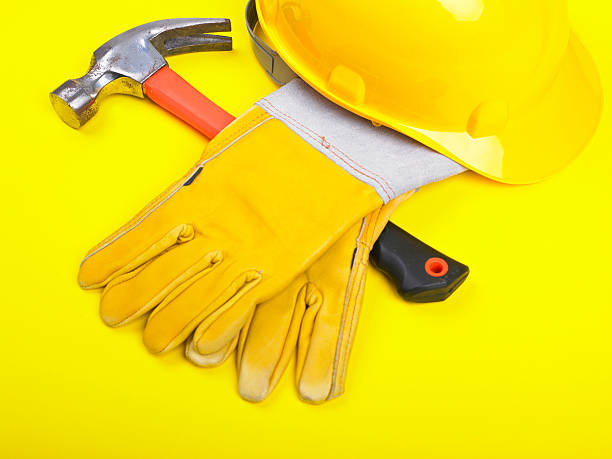 istock Worker equipment - HardHat Hammer And Gloves 153751041