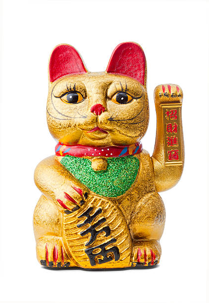 glückliche katzen-maneki neko hält die koban geldmünze - winkekatze stock-fotos und bilder