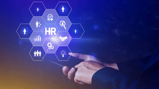istock Businessman hand pressing human resources buttonon smartphone, Human resources, HR management, employment, headhunting concept. 1537516930