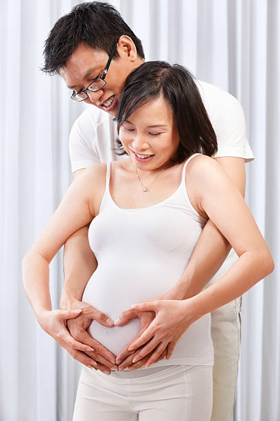 istock Couple showing love over their unborn child 153752676