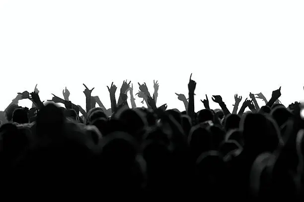 Concert Crowd in front of bright stage lights, black/white version