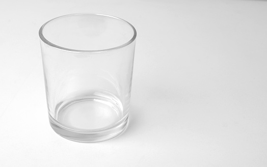 Empty short glass in white background