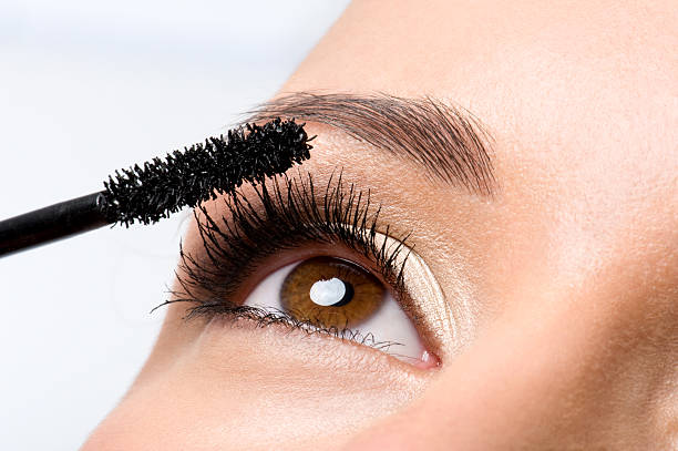 istock Woman applying mascara on eyelashes 153753276