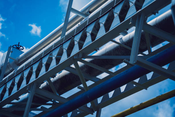 istock Modern steam pipeline for industrial on blue skies background. 1537542643