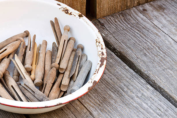 istock Old Pan Full Of Clothespins 153754648