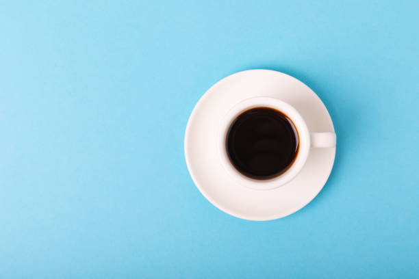 istock Cup of coffee on a blue background. Espresso. View from above. Space for copy. MOCAP. Breakfast. good morning. 1537553576