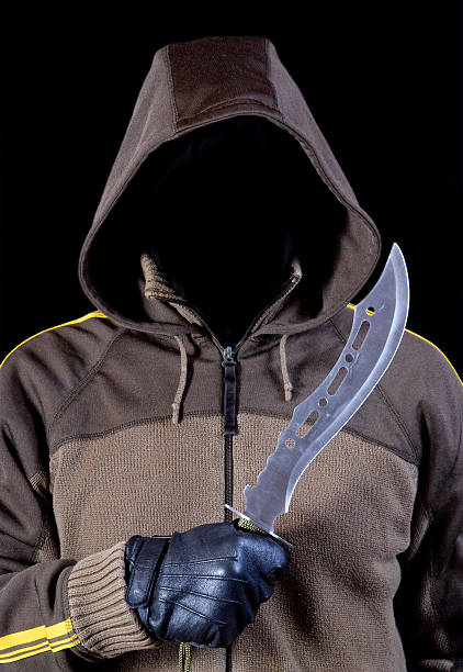 istock invisible face in a hood with knife 153755774