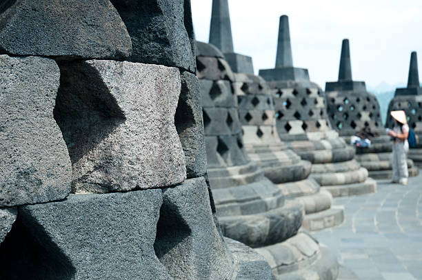 Row of bells at Borobudur, the 9th century buddhist temple in Java, Indonesia