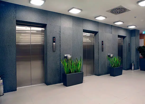 Photo of modern office building and elevators