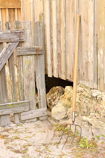 istock Pitchfork Against Wood Farmhouse 153757604