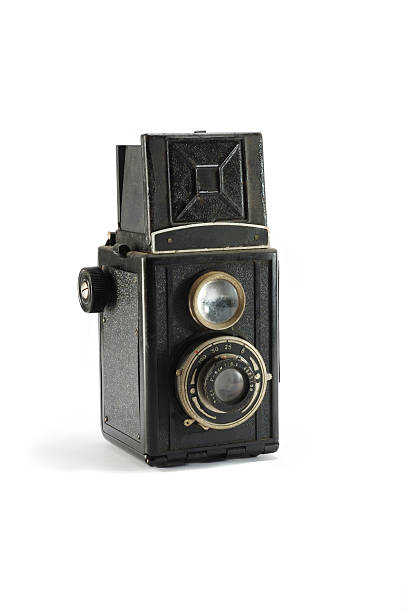 istock Old film photo camera on white background 153758209