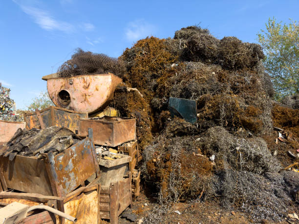 istock Iron waste and shavings in a scrap yard 1537583710