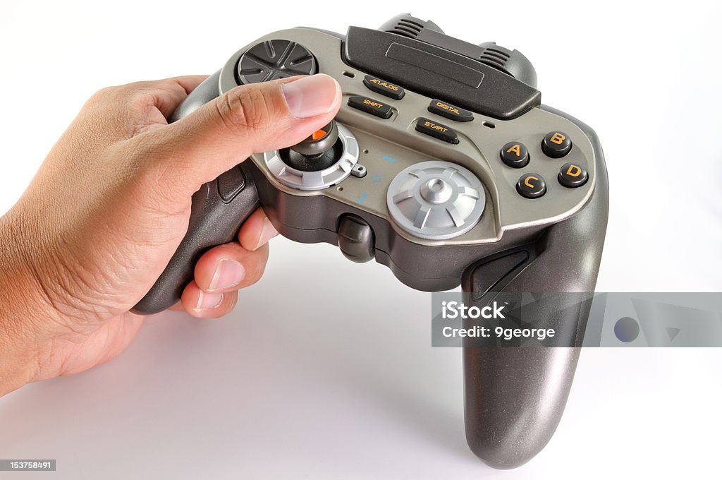 Brincando com joypad no fundo branco - Foto de stock de Brand Name Video Game royalty-free