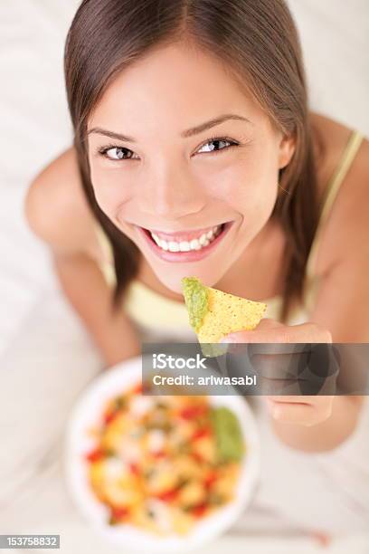 Woman Eating Nachos Stock Photo - Download Image Now - Eating, Nacho Chip, One Woman Only