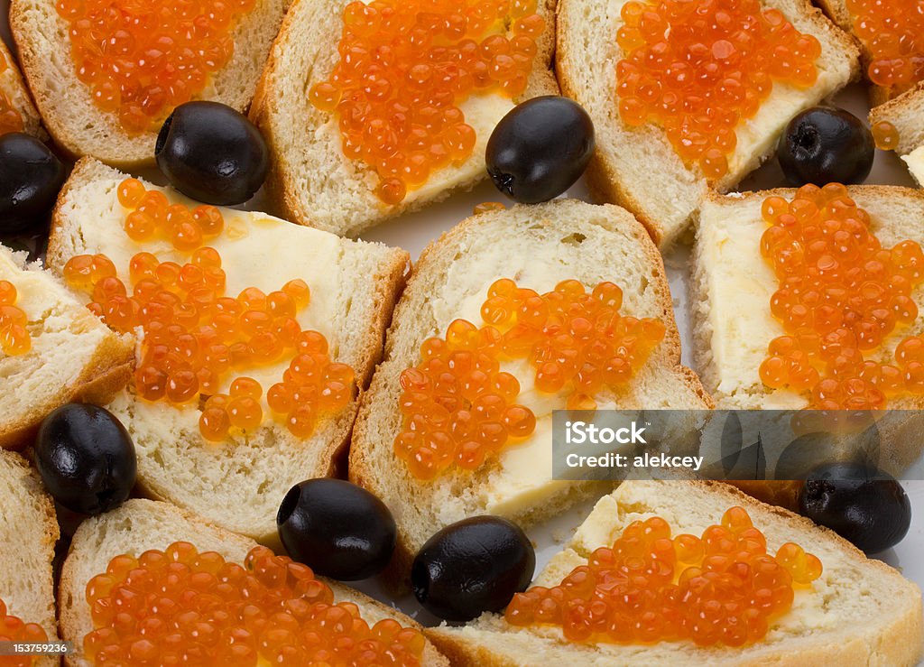 sandwiches with red caviar sandwiches with red caviar, isolated on white Appetizer Stock Photo