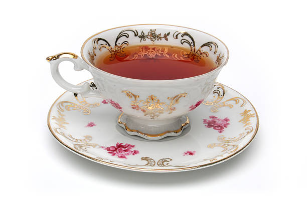 Antique tea cup Antique tea cup on white background saucer stock pictures, royalty-free photos & images