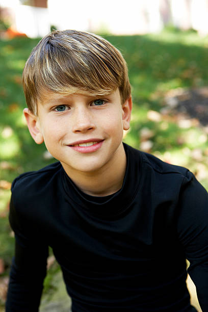 Cute boy who lives next door stock photo