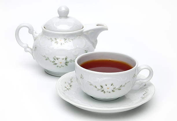 istock Porcelain teapot and teacup 153759563