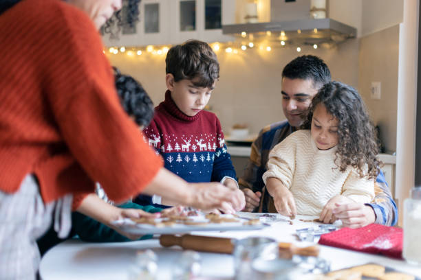 istock Multiracial family joyfully making Christmas cookies 1537615672