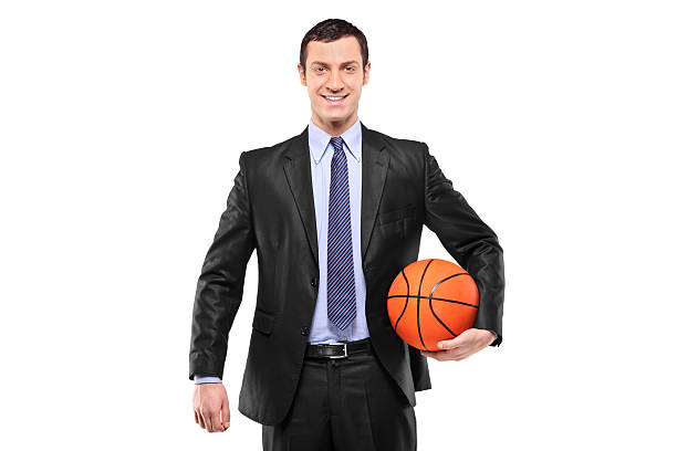 istock Smiling businessman holding a basketball 153762097