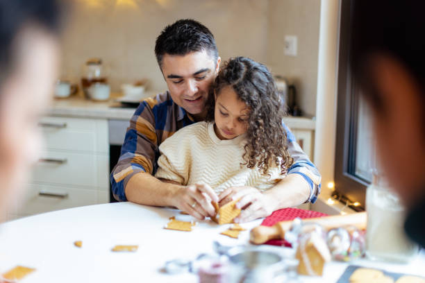 istock Multiracial family joyfully making Christmas cookies 1537632714