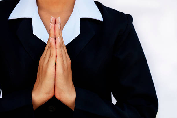 istock Woman holding her hands together 153763798