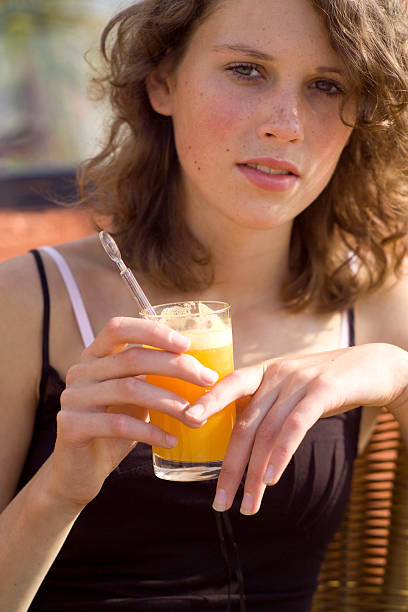istock Drinking orange juice at the patio 153764094