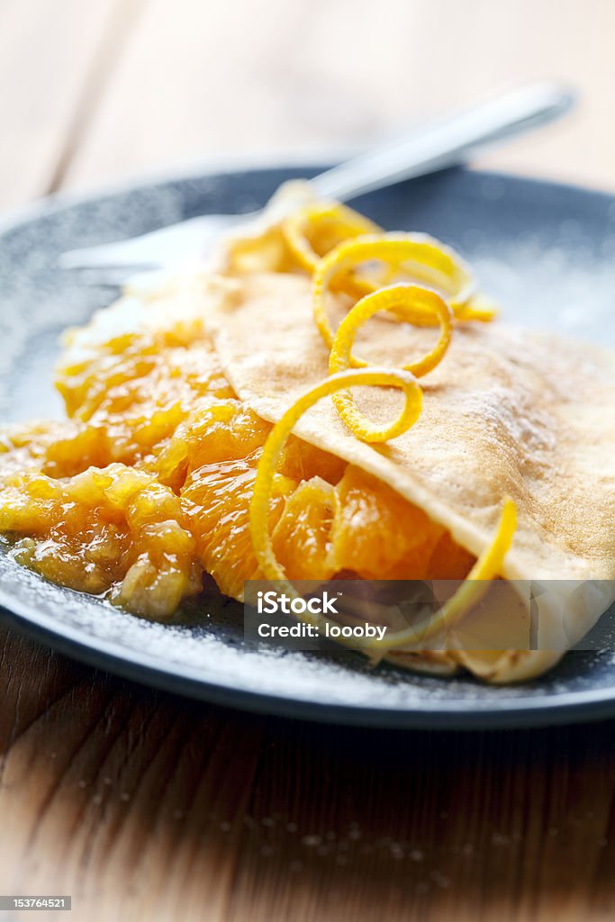 crepe with orange filling thin soft crepe with sweet orange stuffing Close-up Stock Photo