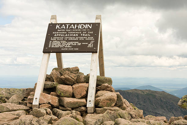 Katahdin Sign Sign at the top of Mt Katahdin, marking the northern terminus of the Appalachian Trail. mt katahdin stock pictures, royalty-free photos & images