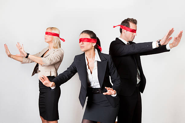 istock Group of disoriented businesspeople 153765514