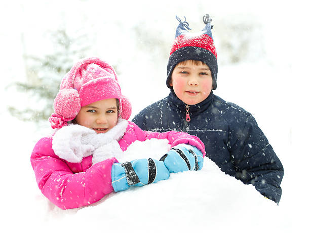 istock Little child playing in snow 153766377